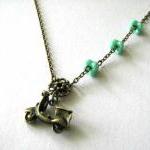 Antiqued Bronze Scooter Necklace With Aqua Green..