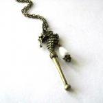 Bronze Seahorse With White Teardrop Pearl Necklace..